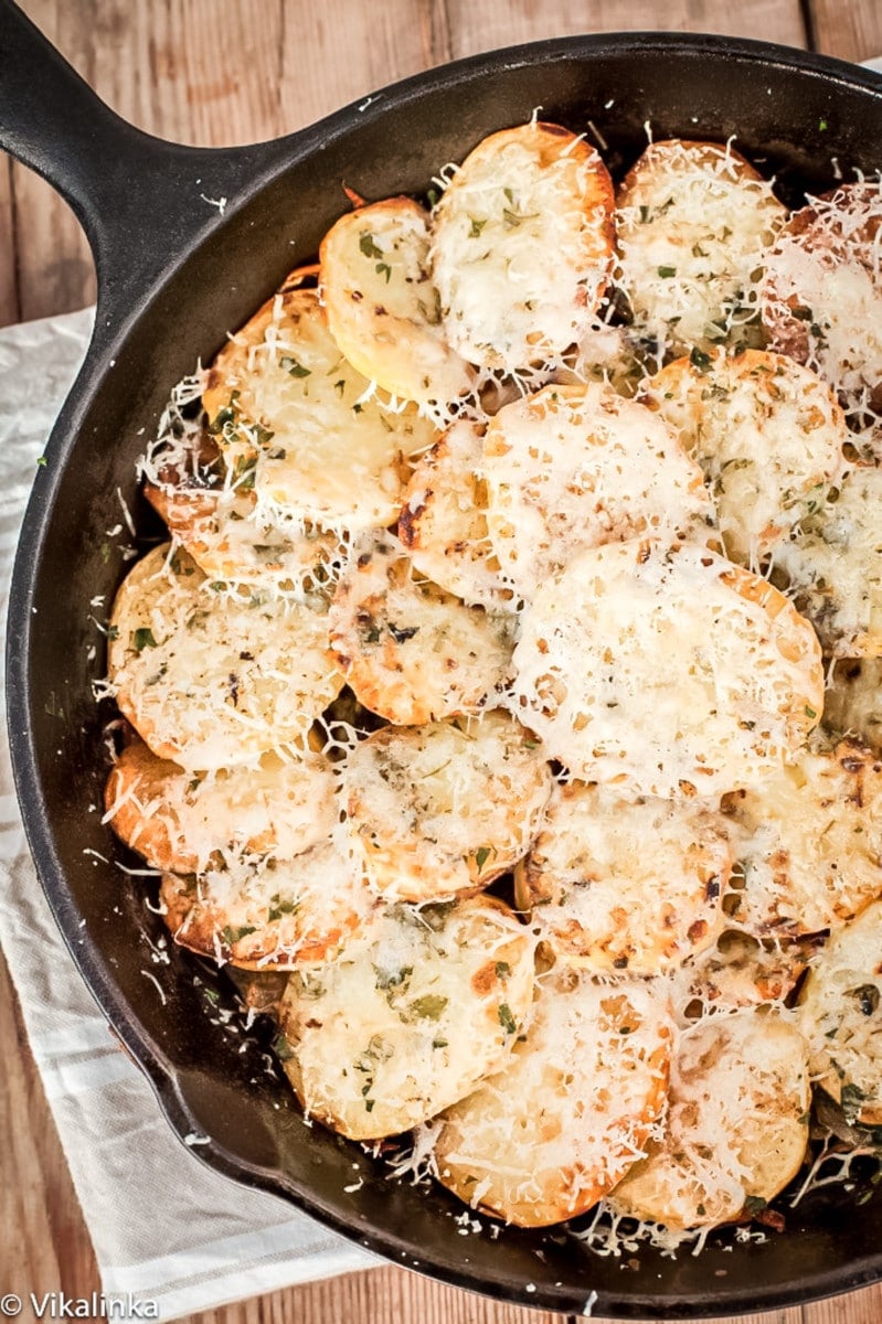 Baked Potatoes layered with caramelized onions, mushrooms and sour cream topped with Pecorino cheese.