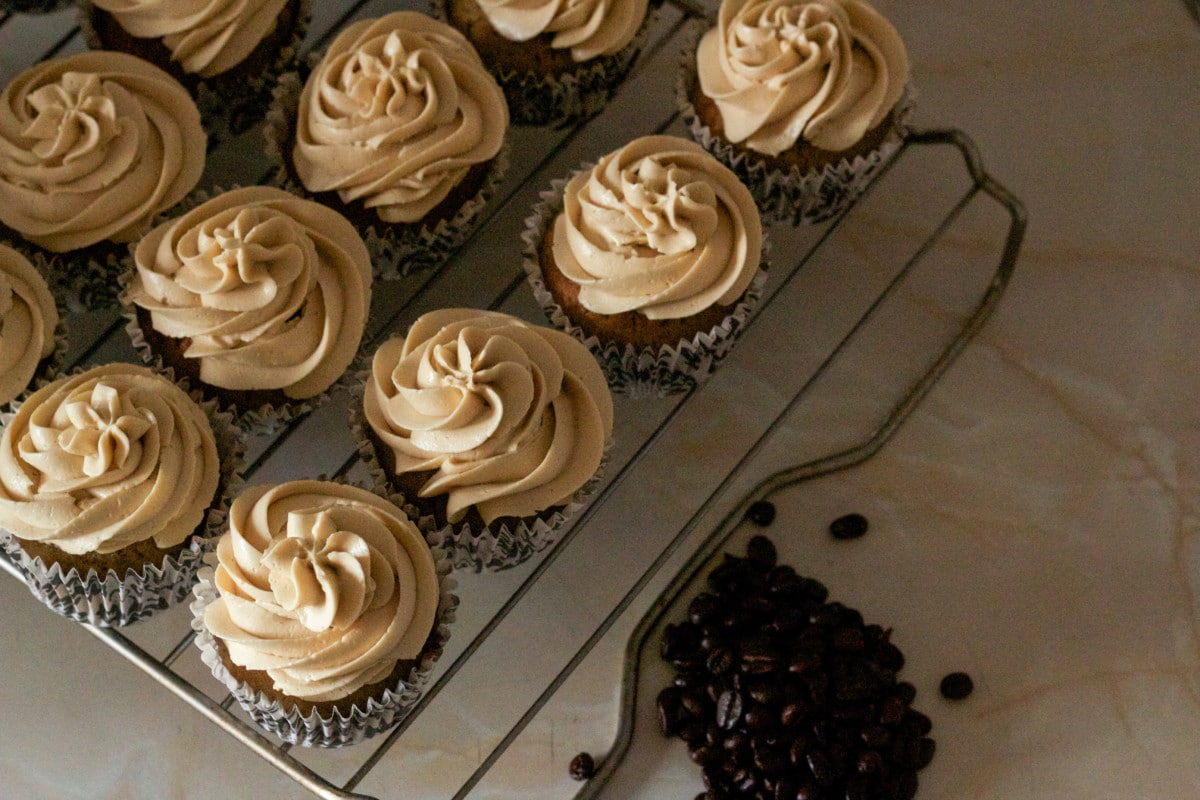 pumpkin spice latte cupcakes on cooling rack