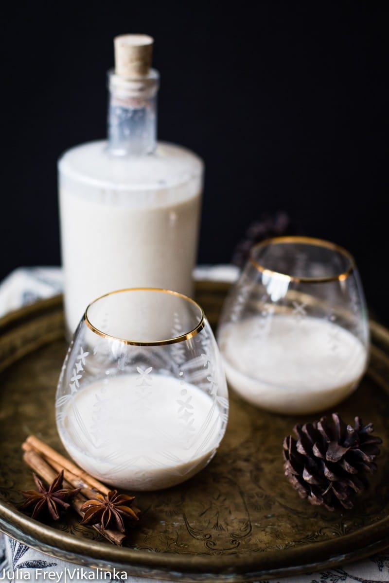 Egg nog on a platter with pine cone