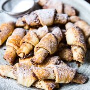 Rugalech on a plate with dusting of sugar
