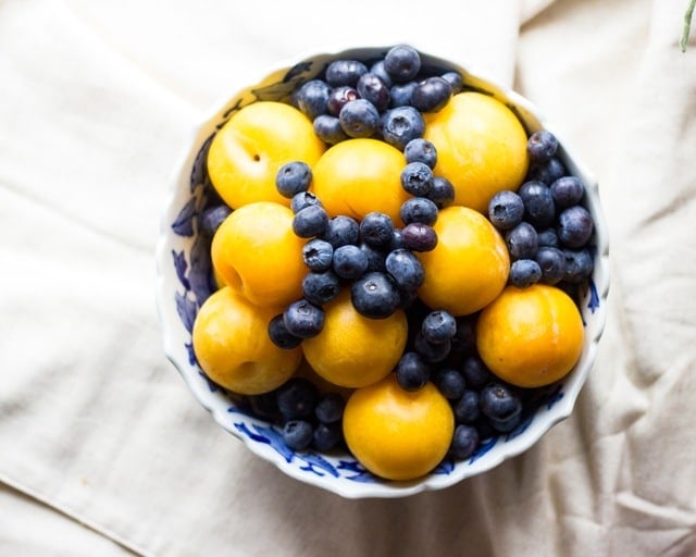 Yellow Plums and Blueberries in a bowl