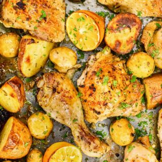 roasted chicken and potatoes with lemon, rosemary and mushrooms