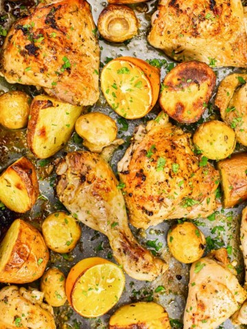 roasted chicken and potatoes with lemon, rosemary and mushrooms