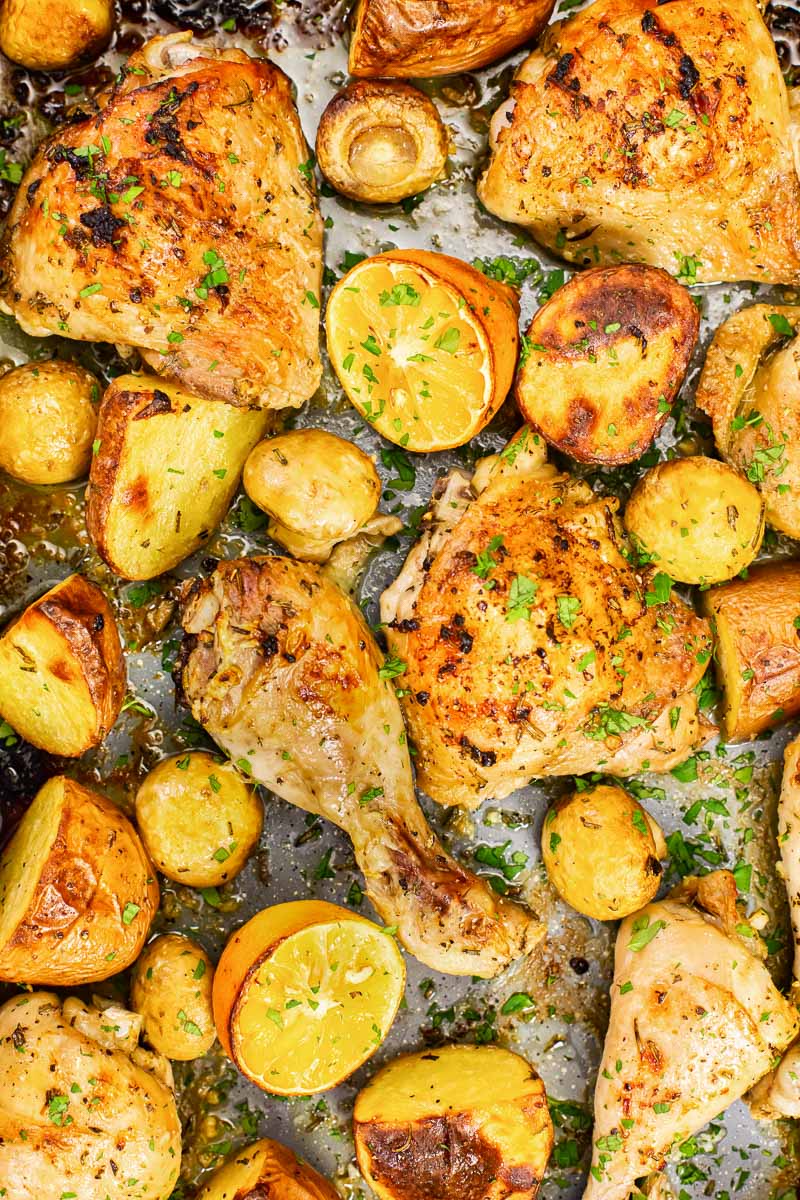 roasted chicken and potatoes with lemon, rosemary and mushrooms