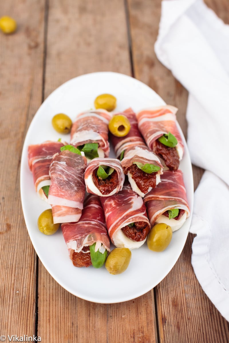 top down of Prosciutto Caprese Parcels on white plate