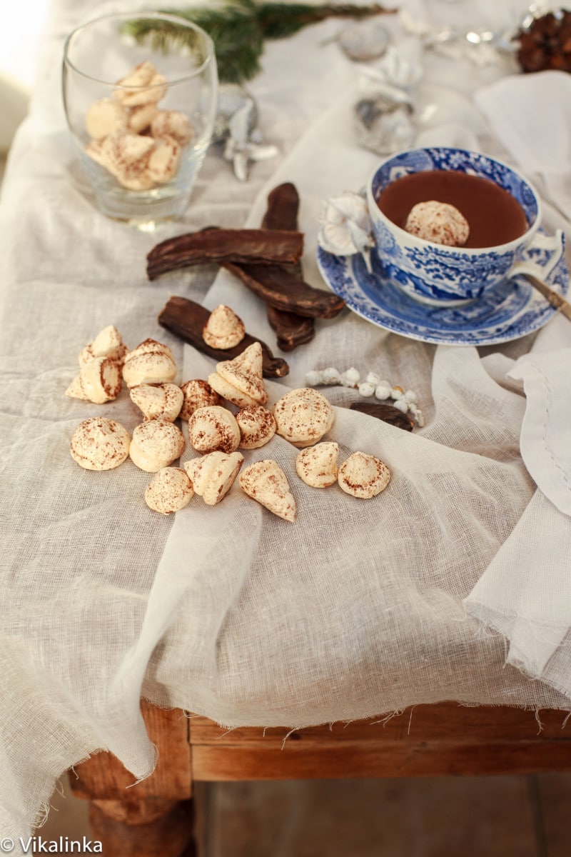 Italian Hot Chocolate next to meringues and cinnamon