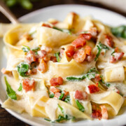 close up of Pappardelle Carbonara with Arugula