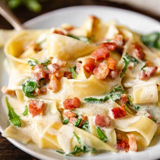 close up of Pappardelle Carbonara with Arugula