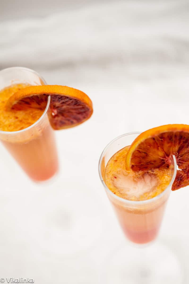 top down view of orange coloured cocktails