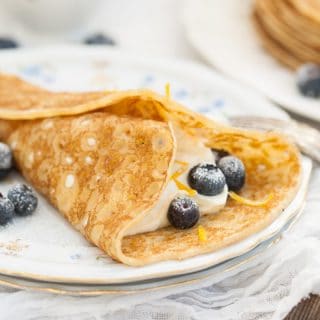 blintzes with sweet cheese filling and blueberries