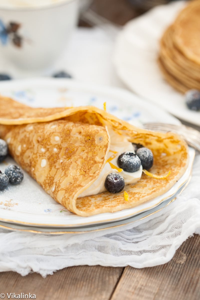 blintzes with sweet cheese filling and blueberries