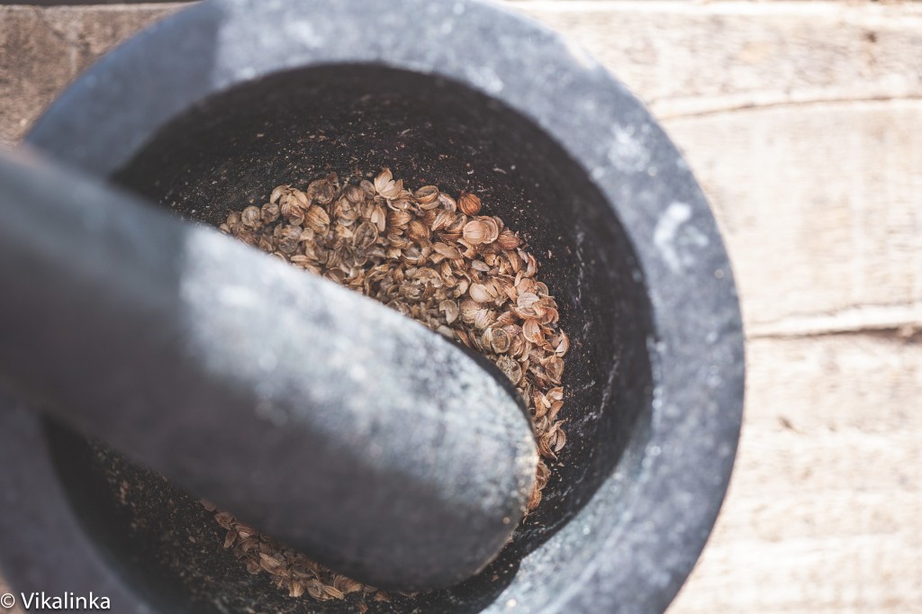 Mortar and pestle crushing spice