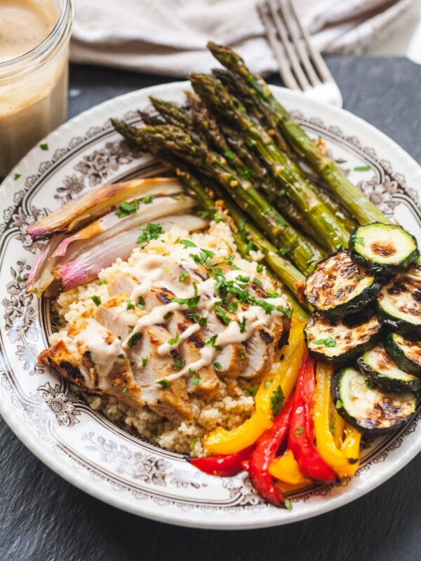 Couscous and chicken dish in a shallow bowl