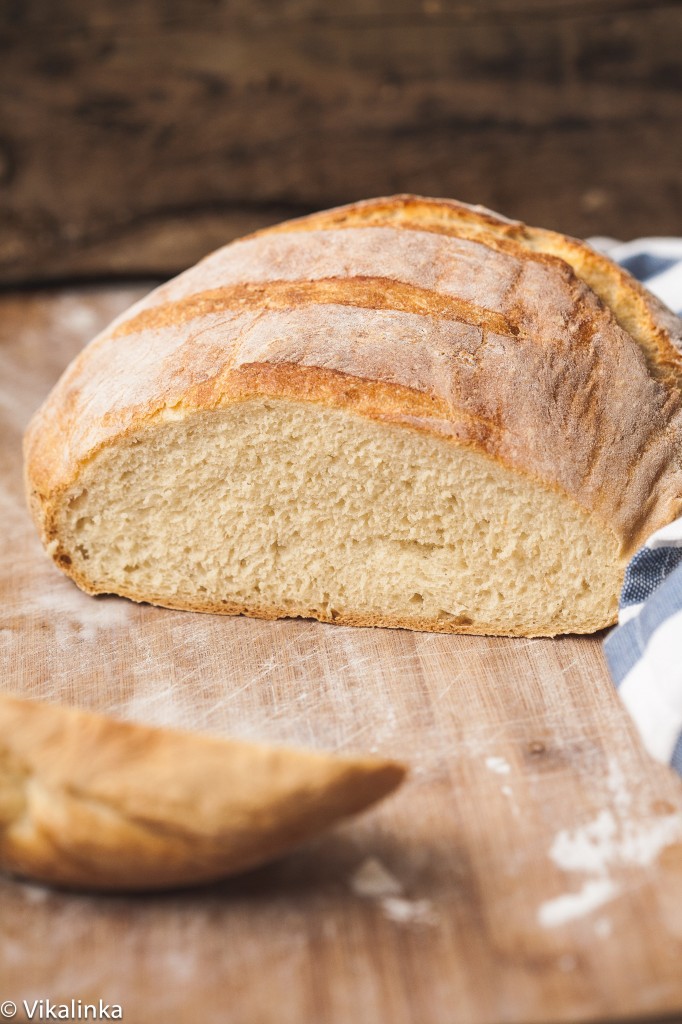 Loaf of bread with slice removed from the side