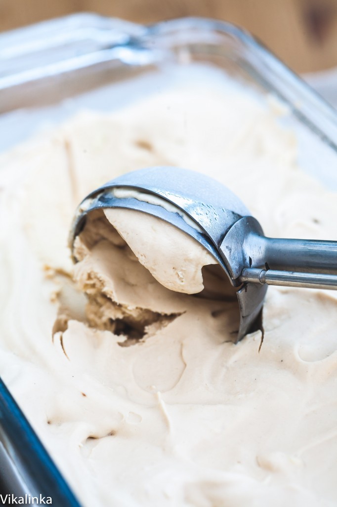 Scoop taking ice cream from a dish