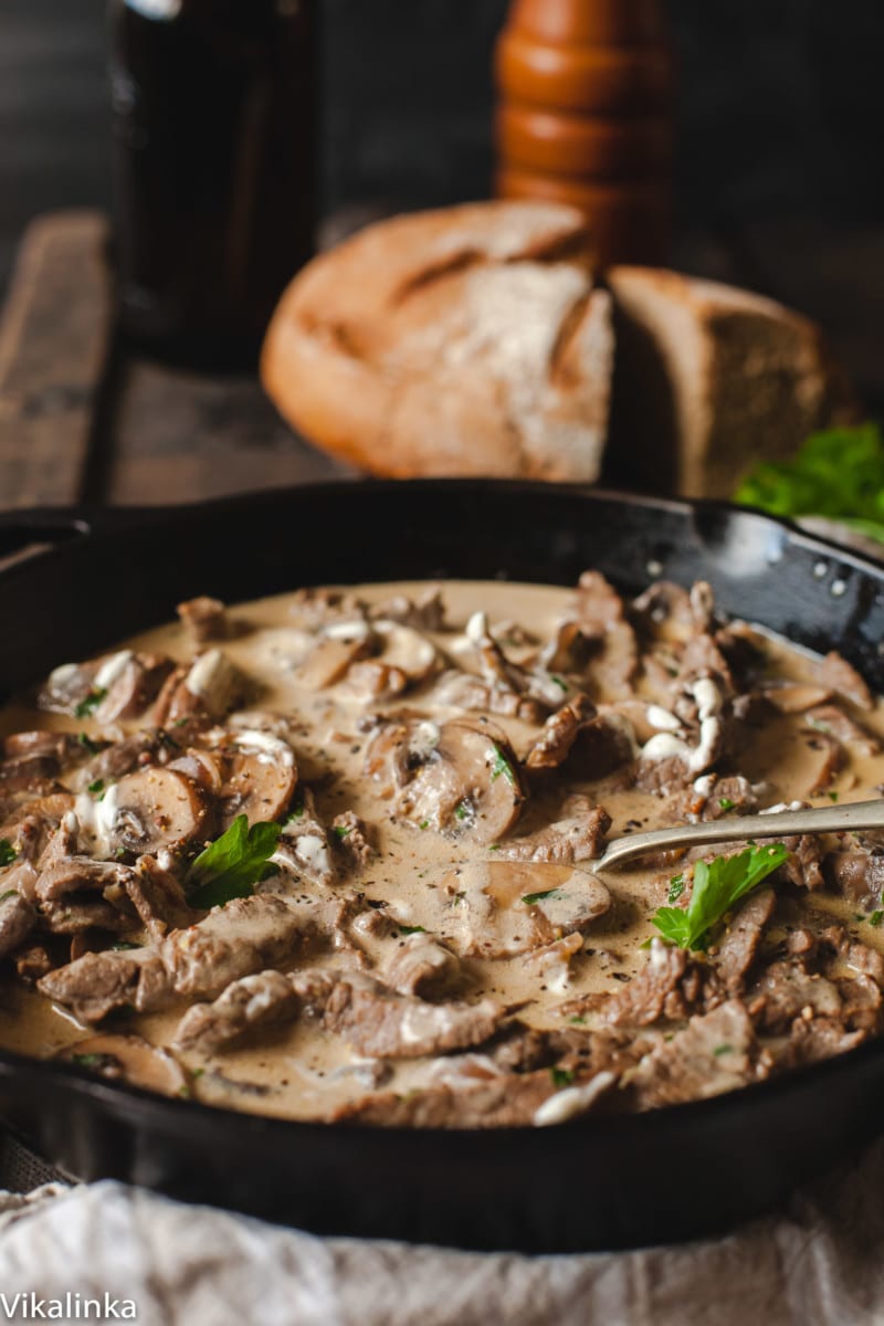 Russian Stroganoff, rye bread in the background