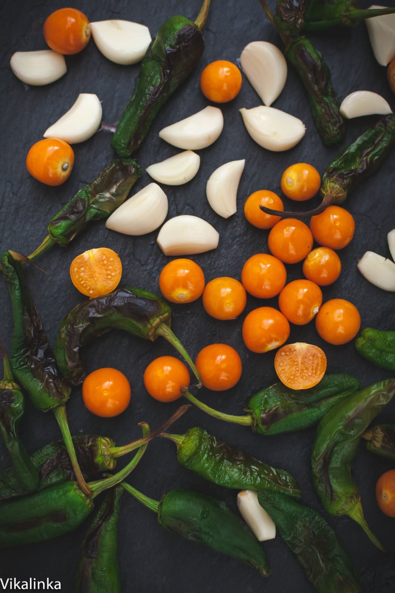 physalis, padron peppers, green chillies and garlic cloves
