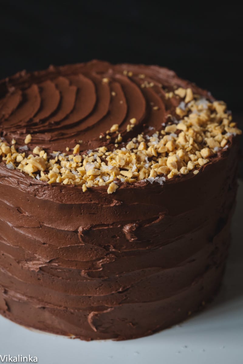 Shot of chocolate honeycomb cake on cake stand