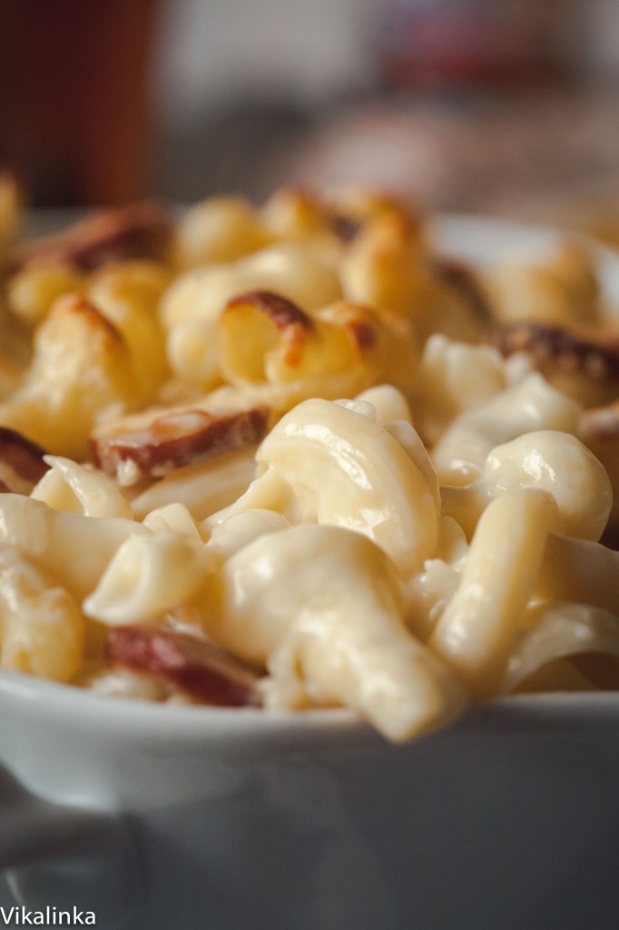 Close up view of cheesy baked mac and cheese