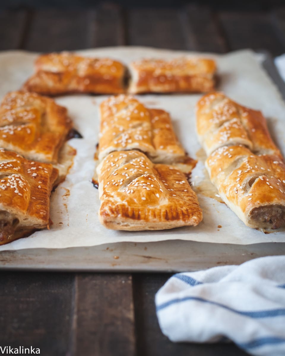 Shot of sausage rolls on parchment paper