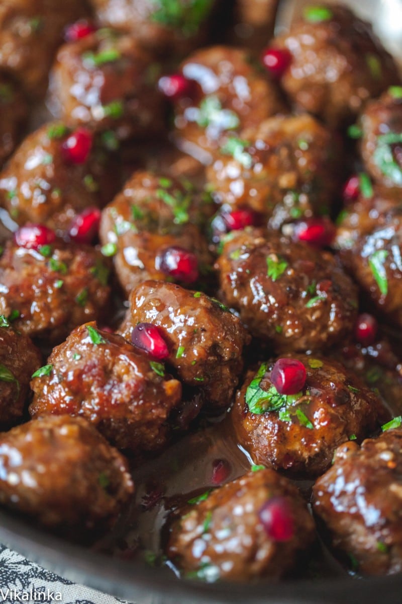 Close up of spicy meatballs in pomegranate sauce