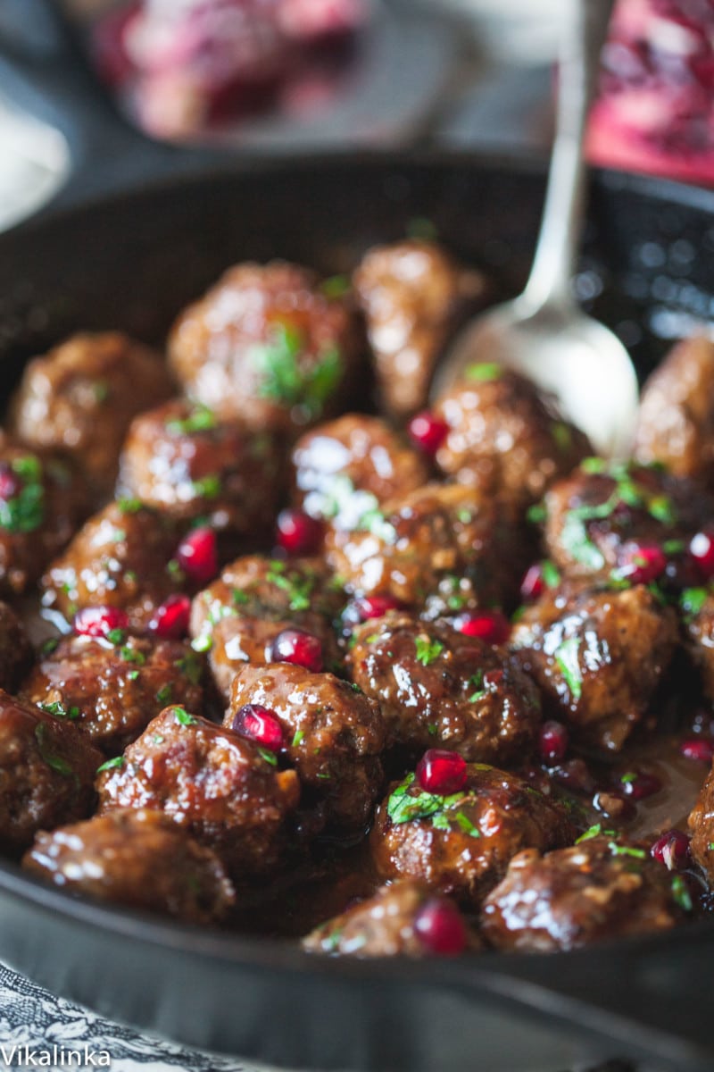 Close up of meatballs with a spoon
