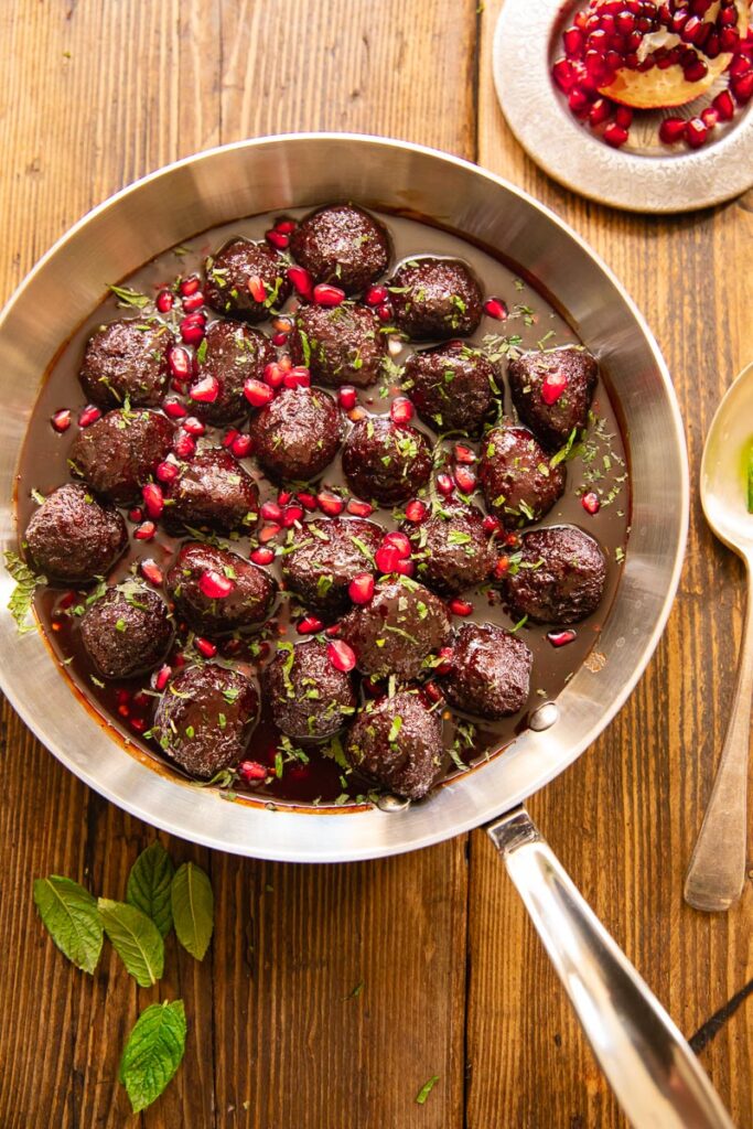 Top down of meatballs on a wood table