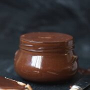 Side shot of homemade nutella in jar
