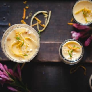 top down view of lemon posset of dark background