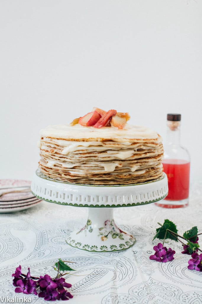 Crepe cake with rhubarb pieces on top