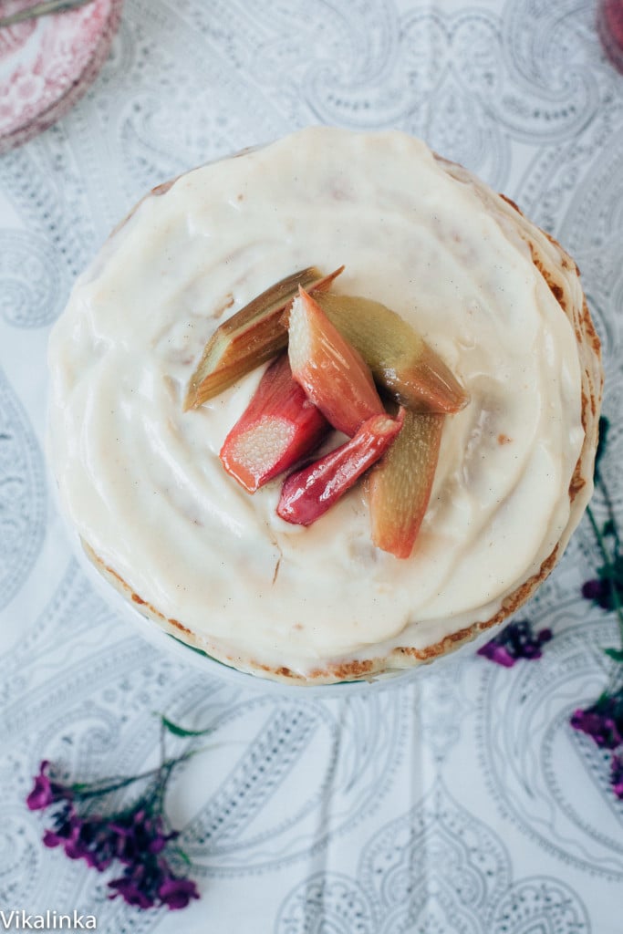 Top down view of cake with rhubarb pieces