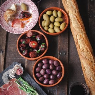 Spread of tapas with baguette