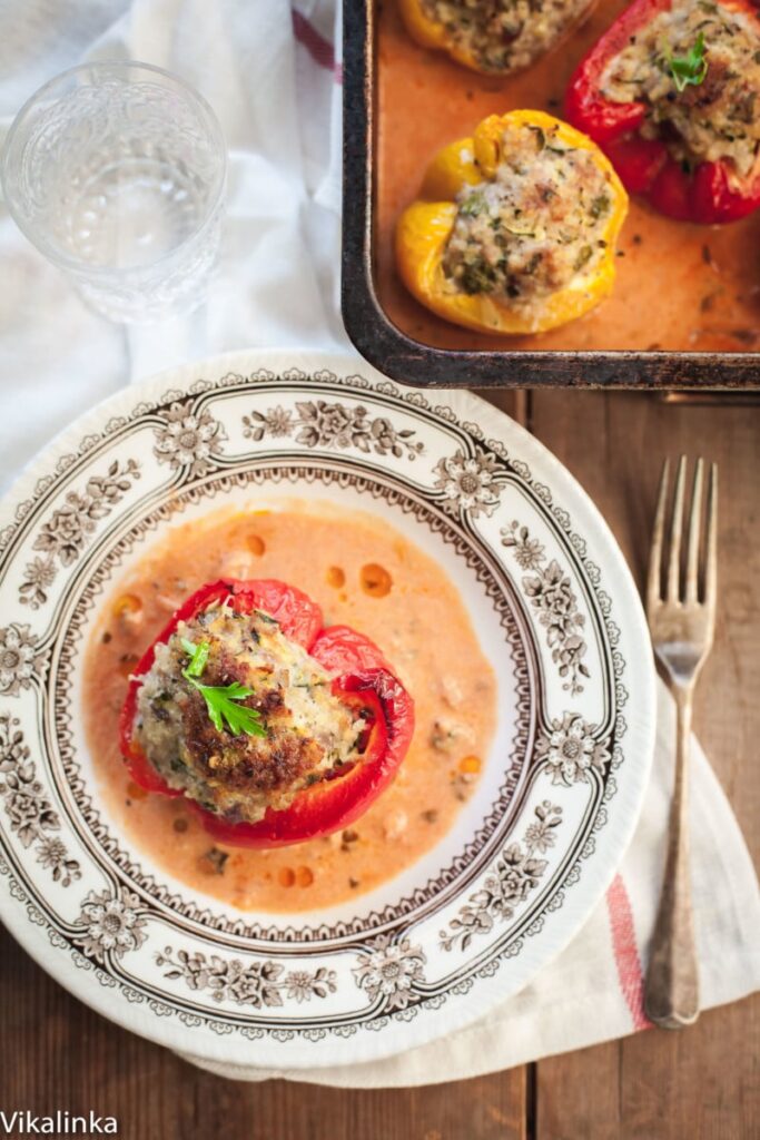 Light and healthy comfort food dinner. These peppers are stuffed with extra-lean pork, shredded zucchini and gluten-free millet grain baked in a creamy tomato sauce. A family favourite!