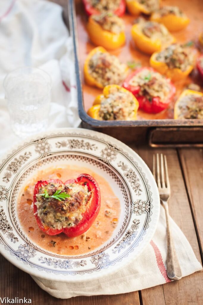 Light and healthy comfort food dinner. These peppers are stuffed with extra-lean pork, shredded zucchini and gluten-free millet grain baked in a creamy tomato sauce. A family favourite!