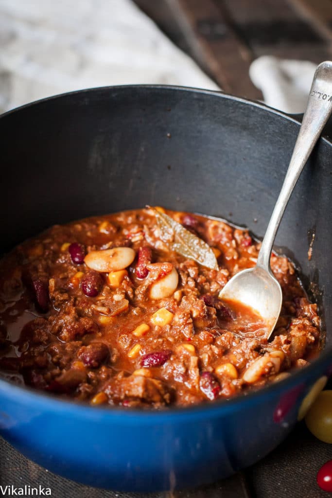 A pot of the dish with a serving spoon