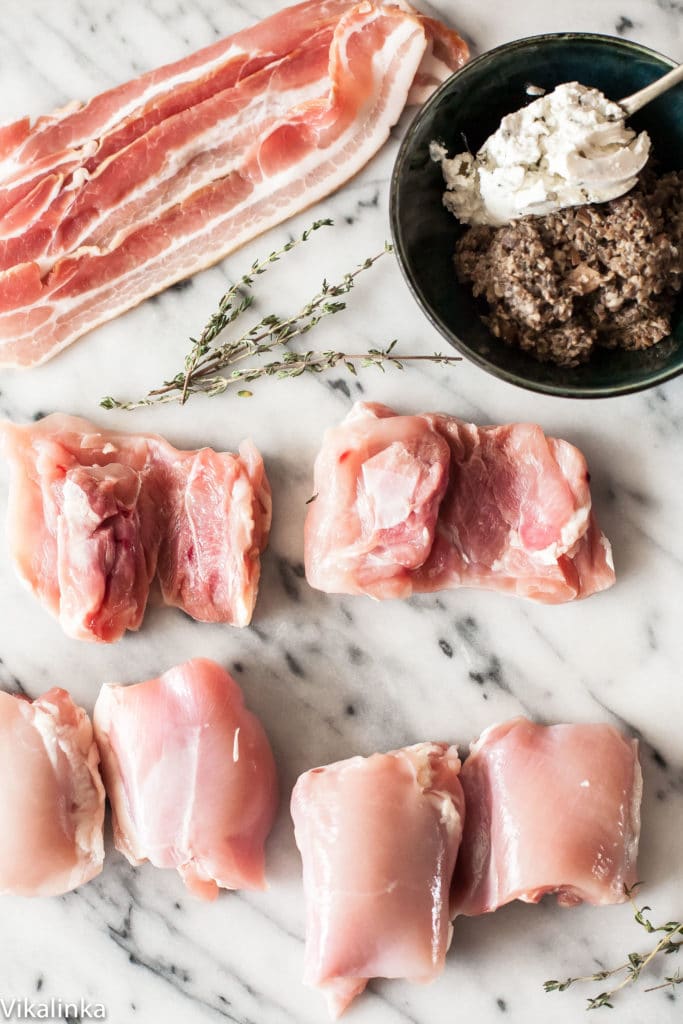 These chicken thighs stuffed with mushrooms and goat cheese and wrapped in bacon are a lot easier to make than they look. What a fantastic way to serve chicken! 