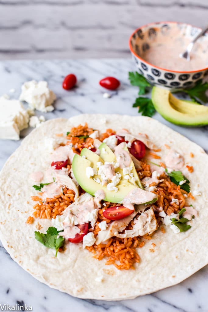 Delicious Peri Peri Rice and Chicken Wrap with Avocado and Spicy Yogurt Sauce. Your lunch just got very exciting!