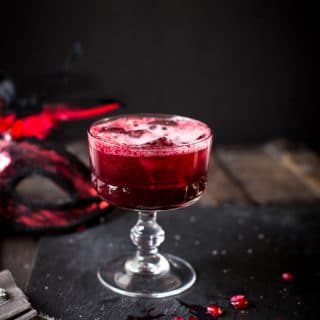 red berry cocktail, on dark grey background