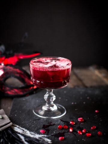 red berry cocktail, on dark grey background