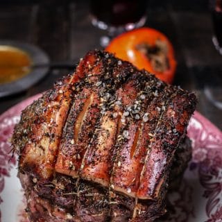 Cooked pork roast on a serving platter