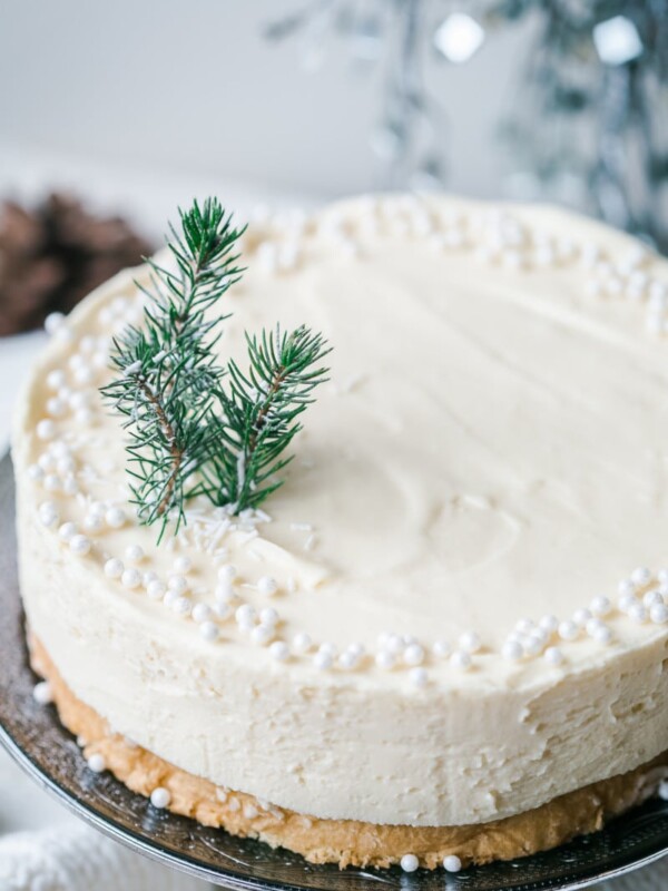 Cake with beads and a small piece of evergreen