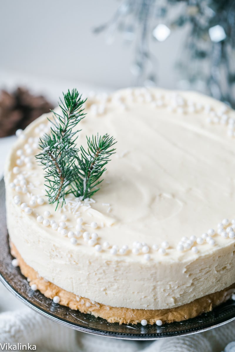 Cake with beads and a small piece of evergreen