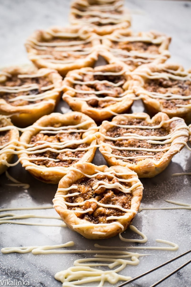 butter tarts drizzled with white chocolate