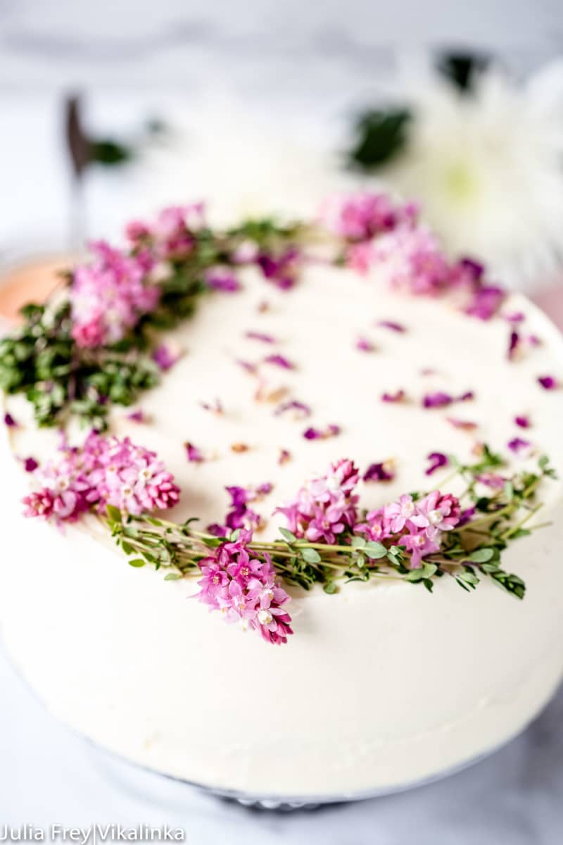 Delicate vanilla bean flavoured sponge layered with rhubarb curd and frosted with rose water and vanilla mascarpone. This cake is what dreams are made of! 