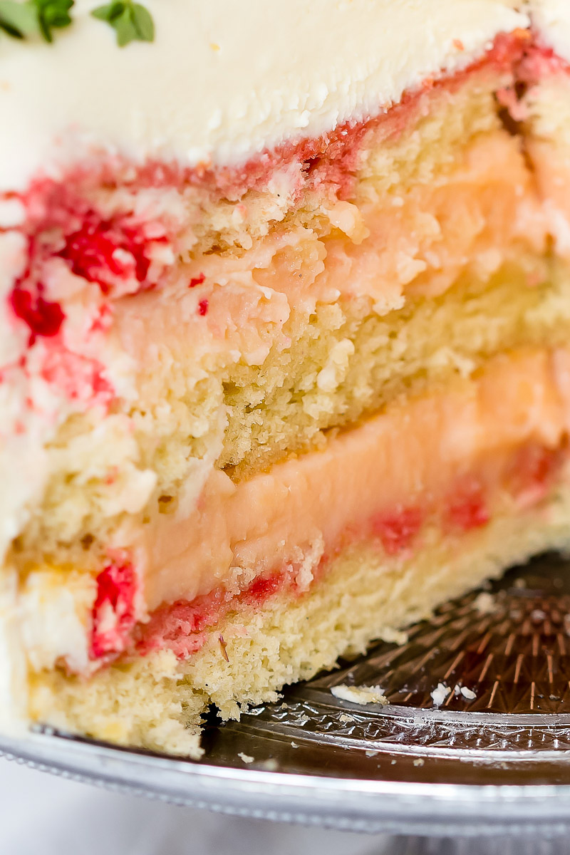 close up of vanilla sponge cake with rhubarb curd filling