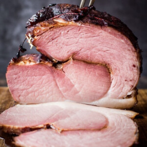 Sliced ham with blackberry compote