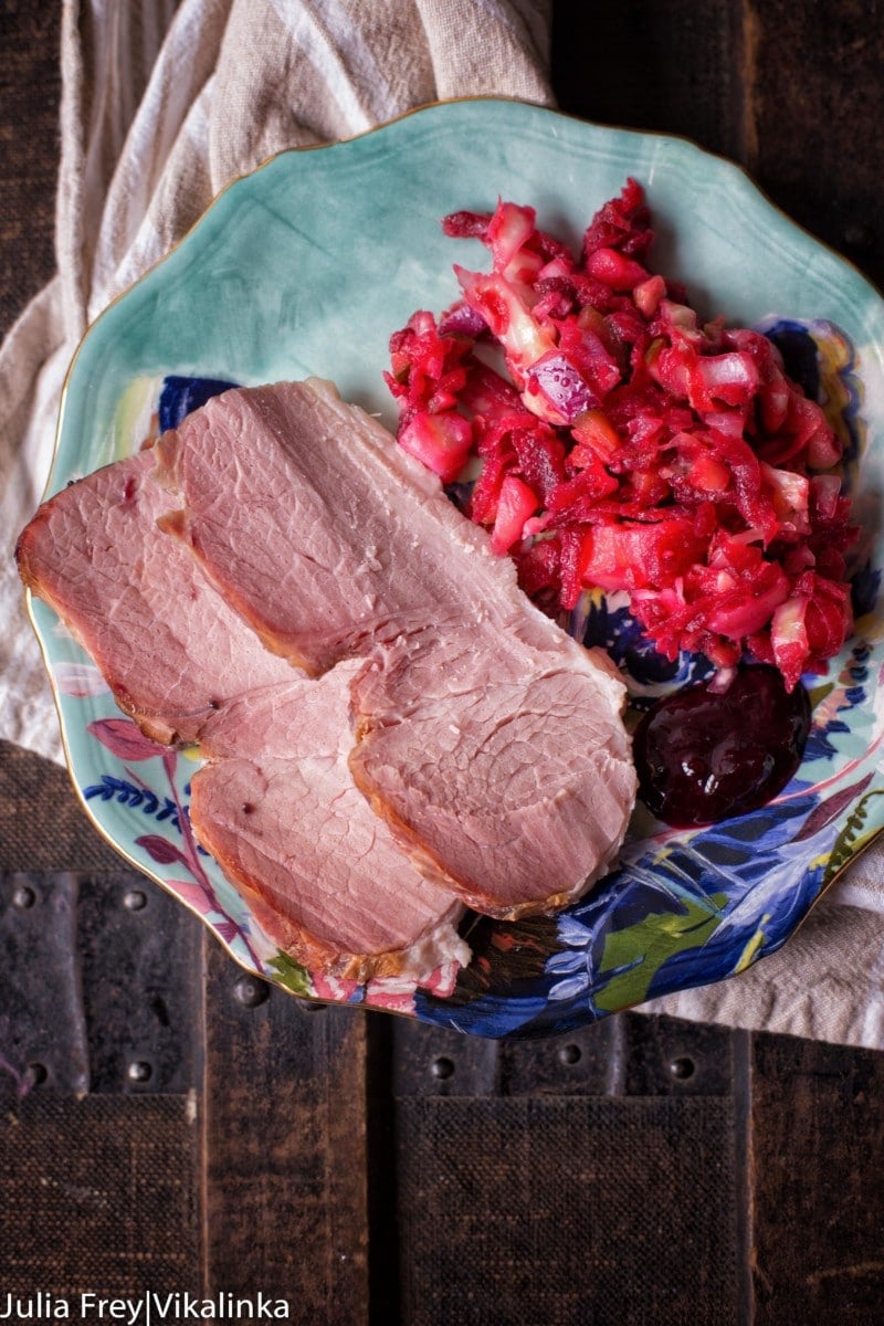 Sliced meat and cabbage slaw on a plate