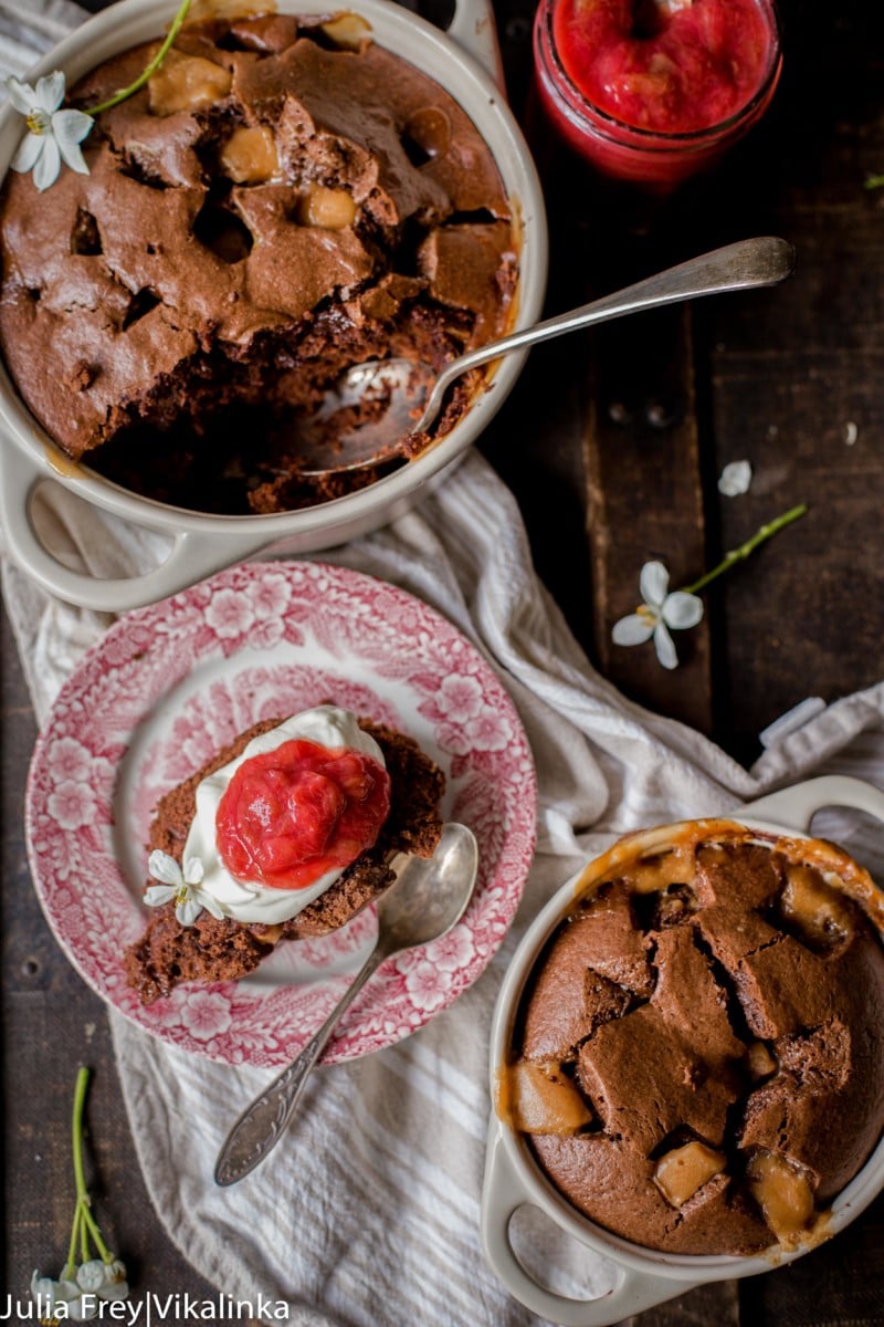 top down view of chocolate fudge cake with stewed rhubarb