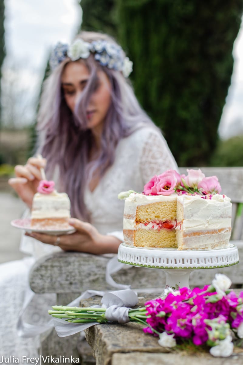 Cake with slice removed and eaten in the background