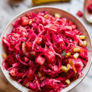 red cabbage and beet salad in a grey bowl